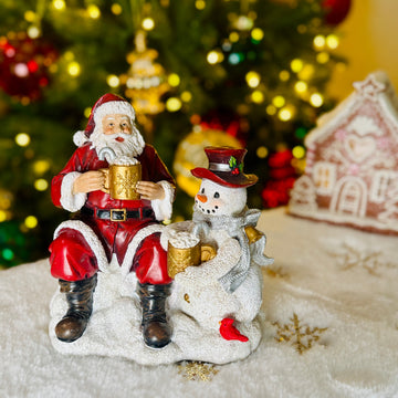 Santa and Snowman Drinking Hot Cocoa for